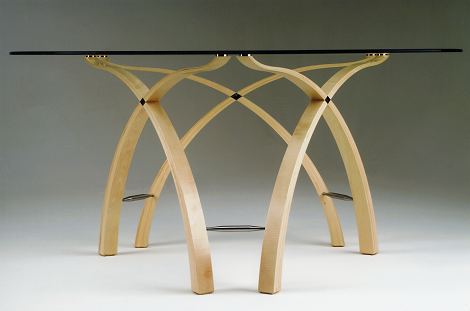 Glass topped table in maple with stainless steel and abalone mother of pearl details