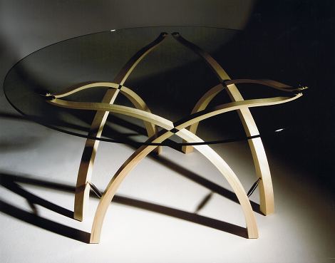Glass topped table in maple with stainless steel and abalone mother of pearl details