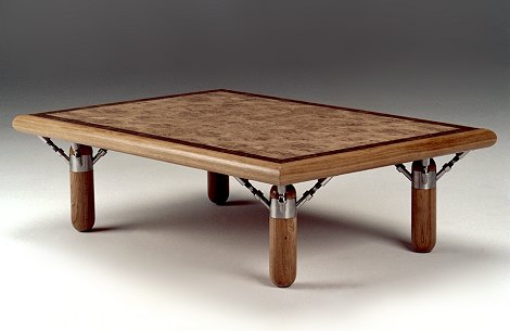 Low occasional table in burr oak, yew oysters and stainless steel